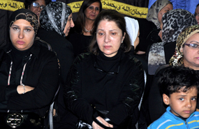 التأثر على وجه بوسي في العزاء