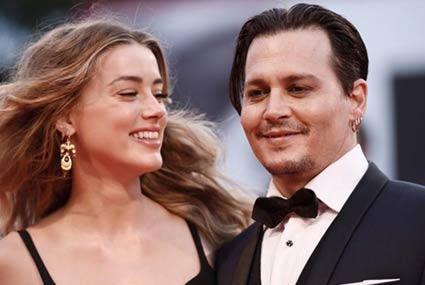 جوني ديب في مهرجان &quot;فينيسيا&quot; مع زوجته