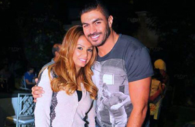 خالد سليم وزوجته وابنتهما