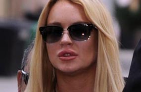 لوهان أثناء توجهها للمحكمة قبل الحكم بحبسها