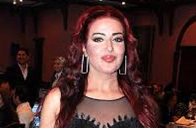 سمية الخشاب تستعرض رشاقتها بفستانها الشفاف بمنطقة البطن