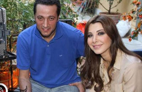 نانسي عجرم مع المخرج وليد ناصيف أثناء تصوير الكليب