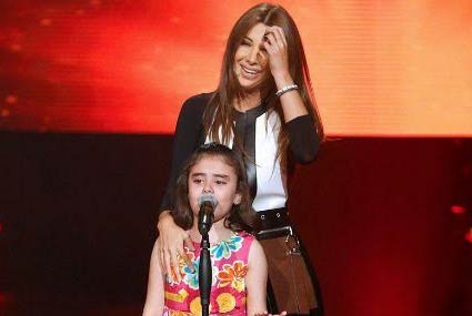 نانسي عجرم تحاول التخفيف عن غنى