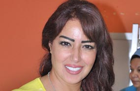 سمية الخشاب خلال مشاركتها في انتخابات الرئاسة المصرية 2014
