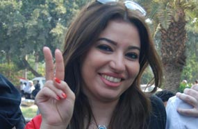 غادة رجب بعلم مصر في احتفالات أكتوبر