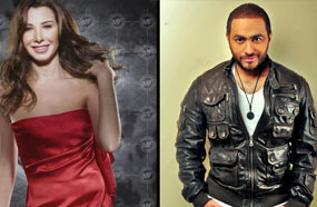 تامر ونانسي يغنيان في الصالة المغطاة