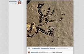 رسم زينة على الرمال