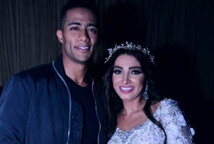 روجينا ومحمد رمضان في كواليس العرض