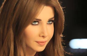 نانسي عجرم في لقطة من كليب &quot;وبكون جايي بودعك&quot;