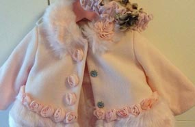 الفستان الذي ارتدته الطفلة أثناء تعميدها