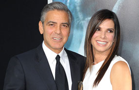 ساندرا بولوك مع جورج كلوني في افتتاح Gravity 