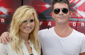 سيمون كاول مع ديمي لوفاتو 