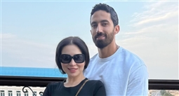 مي عز الدين وزوجها