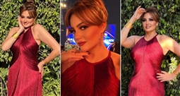 بشرى في الفستان الأحمر
