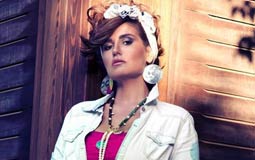 هنا شيحة تستعيد ذكريات طفولتها بهذه الصورة